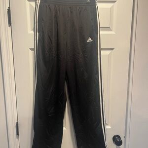 Adidas Black Sweatpants with Iconic Stripes